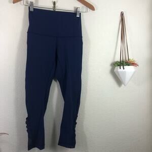 Lululemon Minimalist crop leggings in blue - mesh criss cross high rise